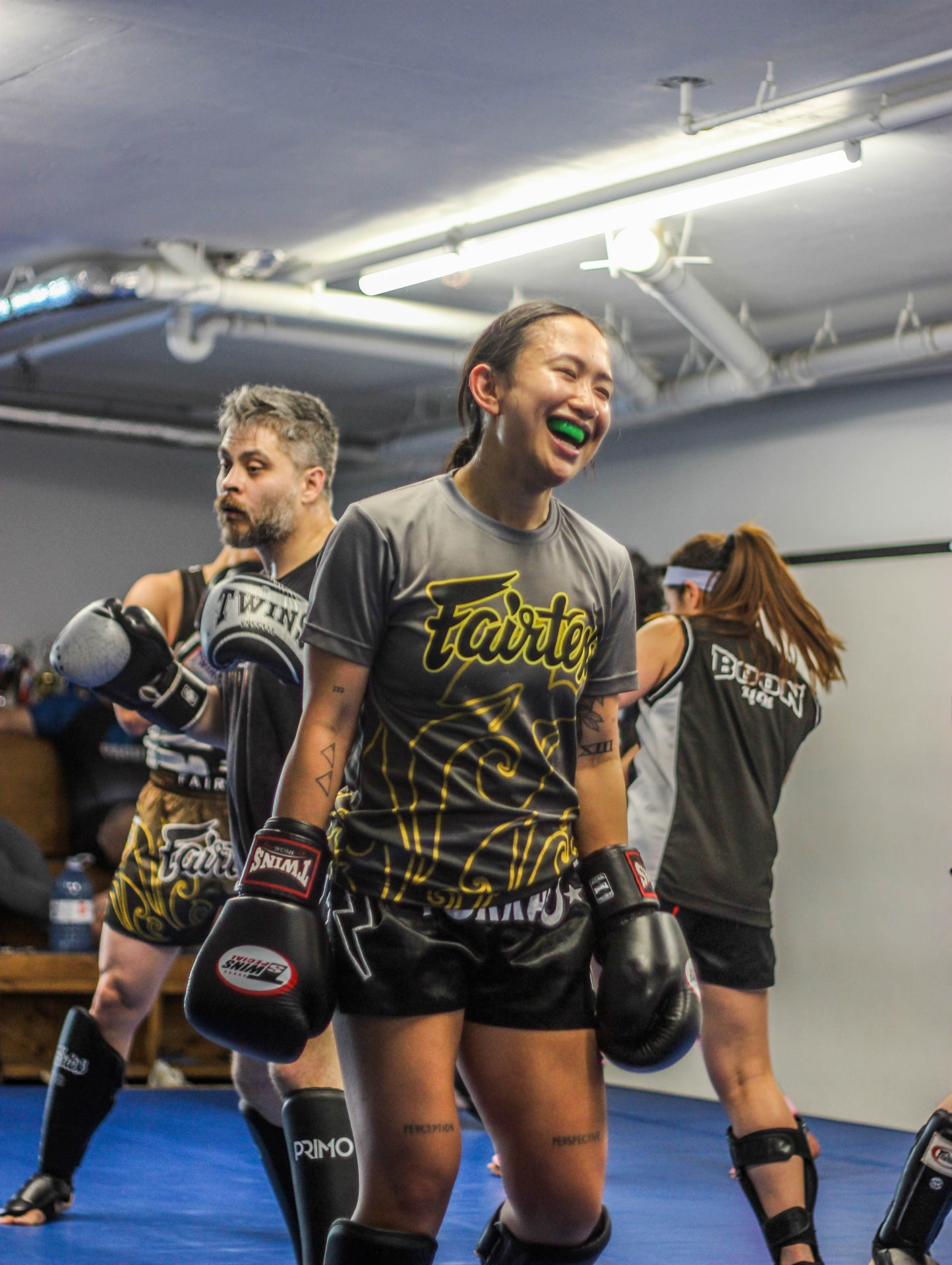 Smiling Dream Fighters Canada student during a Muay Thai class at PTT Vancity